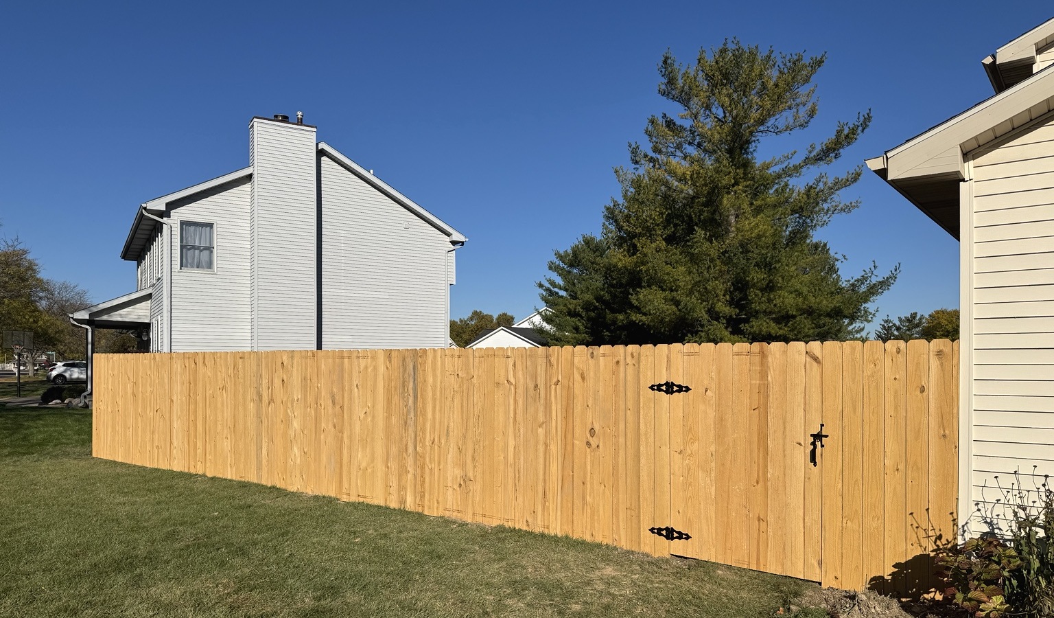 New wood privacy fence installation
