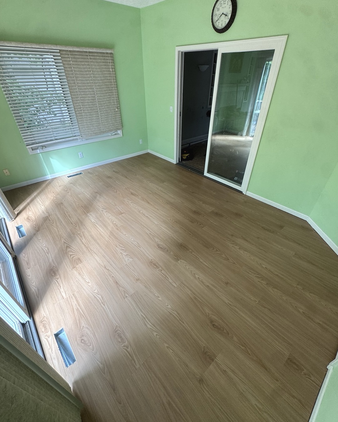 New wood-look flooring in a bright room